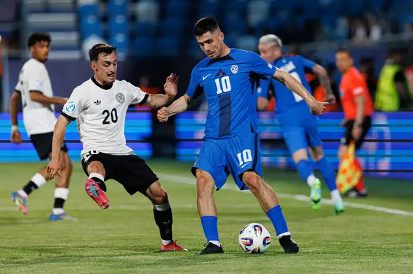 Paul Nebel ve Svit Seslar, Almanya ve Slovenya milli takımları arasında oynanan UEFA U-21 2025 maçında görüldü (Maciej Rogowski)