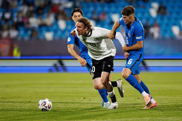 Almanya ve Slovenya milli takımları arasında oynanan UEFA Euro U-21 2025 maçında Enrick Ostrc, Nick Woltemade ve Zan Jevsenak görüldü (Maciej Rogowski)