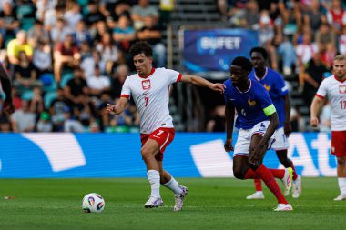 Kajetan Szmyt ve Lucien Agoume, UEFA Euro U-21 2025 maçında Fransa ve Polonya milli takımları arasında görüldü (Maciej Rogowski)
