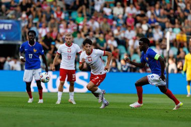 Kajetan Szmyt ve Lucien Agoume, UEFA Euro U-21 2025 maçında Fransa ve Polonya milli takımları arasında görüldü (Maciej Rogowski)