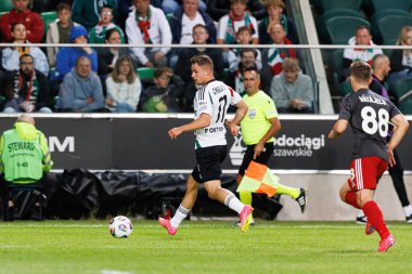 UEFA Avrupa Ligi 1. tur eleme maçında Kacper Chodyna, Legia Warszawa ve FK Aktobe takımları arasında Stadion Miejski Legii Warszawa 'da (Maciej Rogowski)