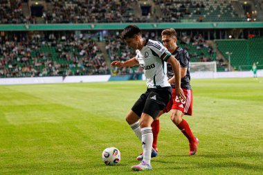 Bartosz Kapustka ve Bogdan Vatajelu, UEFA Avrupa Ligi 1. tur eleme maçında Stadion Miejski Legii Warszawa 'daki Legia Warszawa ve FK Aktobe takımları arasında oynandı.)