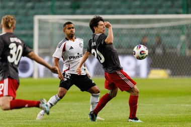 UEFA Avrupa Ligi 1. tur eleme maçında Juergen Elitim ve Georgi Zhukov, Legia Warszawa ve FK Aktobe takımları arasında Stadion Miejski Legii Warszawa (Maciej Rogowski))