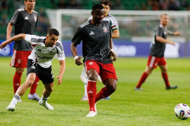 Vahan Bichakhchyan ve Uche Henry Agbo UEFA Avrupa Ligi 1. tur eleme maçında Stadion Miejski Legii Warszawa 'da FK Aktobe ve Legia Warszawa takımları arasında oynandı.)
