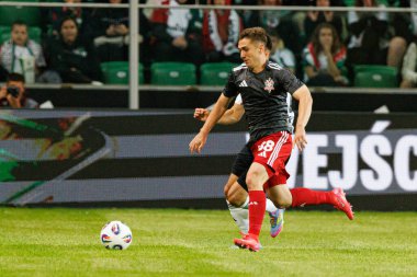 Bogdan Vatajelu UEFA Avrupa Ligi 1. tur eleme maçında Stadion Miejski Legii Warszawa 'daki Legia Warszawa ve FK Aktobe takımları arasında oynandı (Maciej Rogowski)
