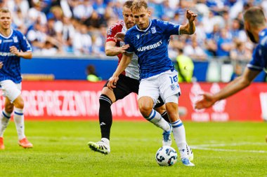 Rafal Augustyniak ve Mateusz Skrzypczak, Süper Puchar Polski maçında Lech Poznan ve Legia Warszawa (Maciej Rogowski)