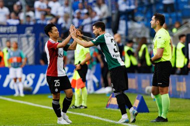 Ryoya Morishita ve Petar Stojanoviç, Süper Puchar Polski maçında Lech Poznan ve Legia Warszawa (Maciej Rogowski) takımları arasında 25 / 26 'da görüldü.)