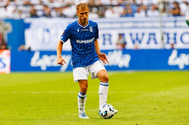 Lukasz Kuzma, Süper Puchar Polski maçında Lech Poznan ve Legia Warszawa (Maciej Rogowski) takımları arasında görüldü.)