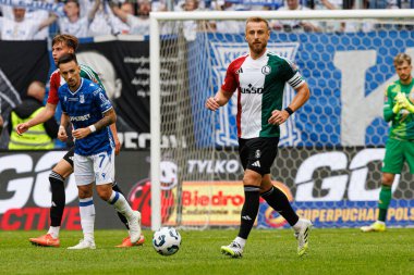 Rafal Augustyniak, Süper Puchar Polski maçında Lech Poznan ve Legia Warszawa (Maciej Rogowski) takımları arasında 25 / 26 'da görüldü.)
