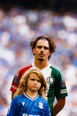 Migouel Alfarela, Süper Puchar Polski maçında Lech Poznan ve Legia Warszawa (Maciej Rogowski) takımları arasında görüldü.)