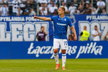 Mateusz Skrzypczak, Süper Puchar Polski maçında Lech Poznan ve Legia Warszawa (Maciej Rogowski) takımları arasında görüldü.)