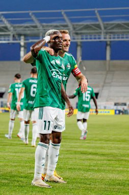 Capita Capemba ve Jan Grzesik, Radomiak Radom ve Pogon Szczecin (Maciej Rogowski) takımları arasındaki PKO BP Ekstraklasa maçında gol üstüne gol atarken görüldü.)