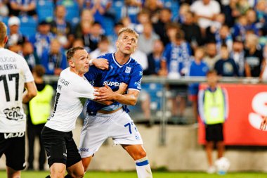Aron Bjarnason ve Mateusz Skrzypczak UEFA Şampiyonlar Ligi elemeleri sırasında görüldü. Lech Poznan ve Breidablik Kopavogur (Maciej Rogowski)