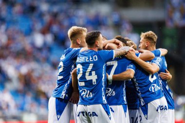 Lech 'in oyuncuları UEFA Şampiyonlar Ligi karşılaşmasında Antonio Miliç' ten gol üstüne gol atarken görüldü. Lech Poznan ve Breidablik Kopavogur (Maciej Rogowski)