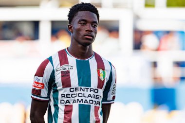 Joao Moises Gastao, Liga Portekiz maçı sırasında GD Estoril Praia ve CF Estrela Amadora (Maciej Rogowski) takımları arasında görüldü.)