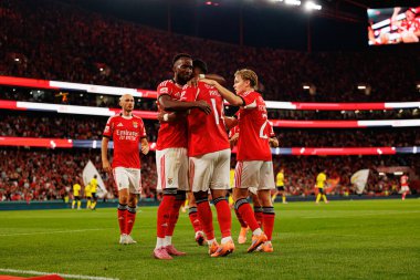 Dodi Lukebakio, Vangelis Pavlidis and Andreas Schjelderup seen celebrating after scoring goal during Liga Portugal game between SL Benfica and Gil Vicente FC (Ball Raw Images/ Maciej Rogowski)