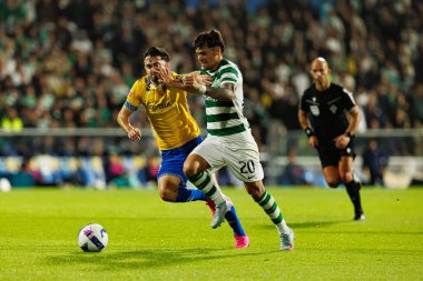 Felix Bacher and Maximiliano Araujo seen during Liga Portugal game between teams of GD Estoril Praia and Sporting CP at Estadio Antonio Coimbra da Mota (Maciej Rogowski/Ball Raw Images)
