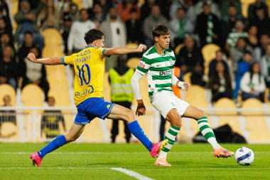 Jordan Holsgrove and Giorgos Vagiannidis seen during Liga Portugal game between teams of GD Estoril Praia and Sporting CP at Estadio Antonio Coimbra da Mota (Maciej Rogowski/Ball Raw Images)