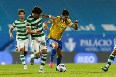 Maximiliano Araujo and Jordan Holsgrove seen during Liga Portugal game between teams of GD Estoril Praia and Sporting CP at Estadio Antonio Coimbra da Mota (Maciej Rogowski/Ball Raw Images)