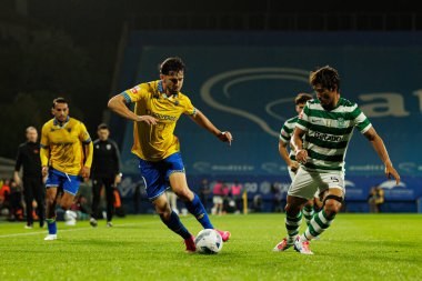 Jordan Holsgrove and Hidemasa Morita seen during Liga Portugal game between teams of GD Estoril Praia and Sporting CP at Estadio Antonio Coimbra da Mota (Maciej Rogowski/Ball Raw Images)