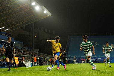 Jordan Holsgrove and Hidemasa Morita seen during Liga Portugal game between teams of GD Estoril Praia and Sporting CP at Estadio Antonio Coimbra da Mota (Maciej Rogowski/Ball Raw Images)