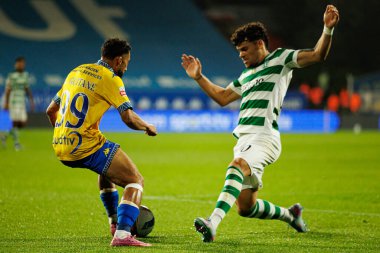 Rafik Guitane and Maximiliano Araujo seen during Liga Portugal game between teams of GD Estoril Praia and Sporting CP at Estadio Antonio Coimbra da Mota (Maciej Rogowski/Ball Raw Images)