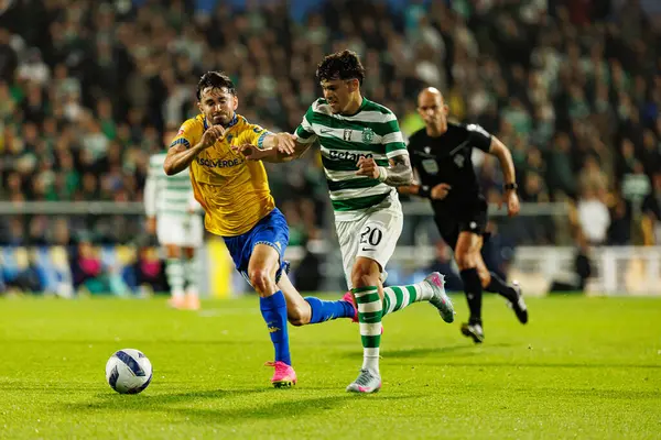 Felix Bacher and Maximiliano Araujo seen during Liga Portugal game between teams of GD Estoril Praia and Sporting CP at Estadio Antonio Coimbra da Mota (Maciej Rogowski/Ball Raw Images)