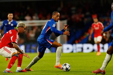 Enzo Barrenechea and Joao Pedro seen during Champions League league phase game between Chelsea FC and  SL Benfica (Maciej Rogowski/ Ball Raw Images)