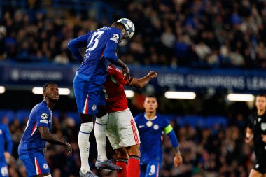 Trevor Chalobah and Vangelis Pavlidis seen during Champions League league phase game between Chelsea FC and  SL Benfica (Maciej Rogowski/ Ball Raw Images)