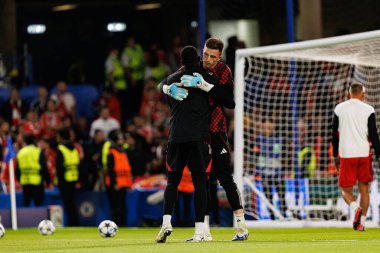Samuel Soares and Anatoliy Trubin seen during Champions League league phase game between Chelsea FC and  SL Benfica (Maciej Rogowski/ Ball Raw Images)