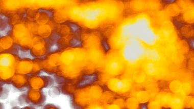 Odaklanamayan sahte ışıklar. Bulanık soyut parıltı dokusu. Arkaplan gece parıldayan altın ışık