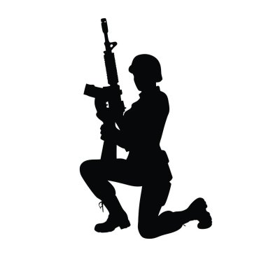 Silahlı bir asker. Asker silueti. Üniformalı asker. Silahlı üniformalı asker. Silahlı bir asker. Kamuflaj üniformalı asker..