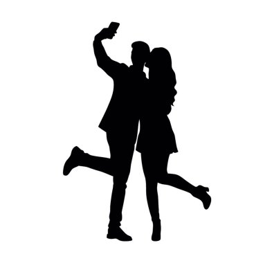 Siyah bir özçekim fotoğrafındaki bir çiftin silüeti.