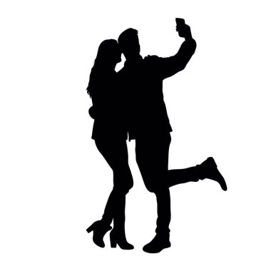 Cep telefonunda selfie fotoğrafı olan bir adamın silueti.