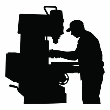 Fabrikada çalışan bir işçinin silueti.