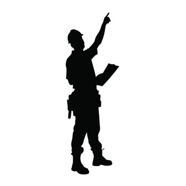 Sert şapkalı bir adam bir şeyi işaret ediyor.