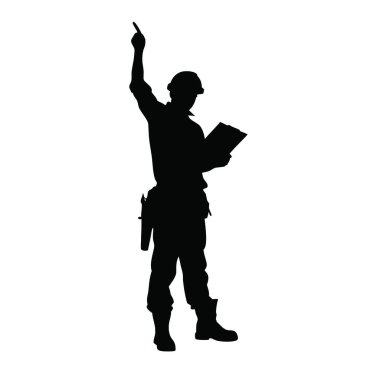 Kasklı ve üniformalı bir adam elinde kitap tutuyor.