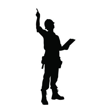 Sert şapkalı bir adam bir şeyi işaret ediyor.