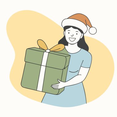 Noel hediyesi kutusunu tutan kadın.