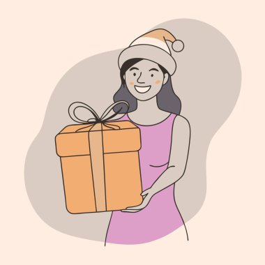 Mutlu genç bir kadın elinde bir hediye kutusu, gülümsüyor ve Noel 'i kutluyor.