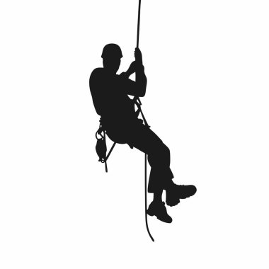 Silüet içinde bir adam tırmanıyor.