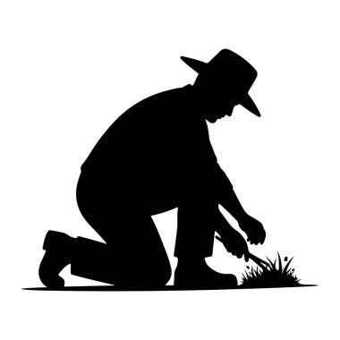 Şapka ve bot giyen bir çiftçinin siyah silueti yerde diz çökerek, küçük bir çimen veya bir aletle bitkilerle ilgilenir. Çiftçi duruşu bitki örtüsüne odaklanmış çalışmayı öneriyor. Görüntü, simsiyah ve beyaz renkli bir agai.