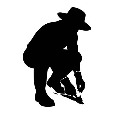 Şapka ve eldiven takmış, toprağa küçük bir tohum ekmek için çömelmiş siyah bir siluet. Bu figür de çizme giyiyor ve küçük bir mala kullanıyor gibi görünüyor. Resim beyaz bir arkaplanda izole edilmiştir.