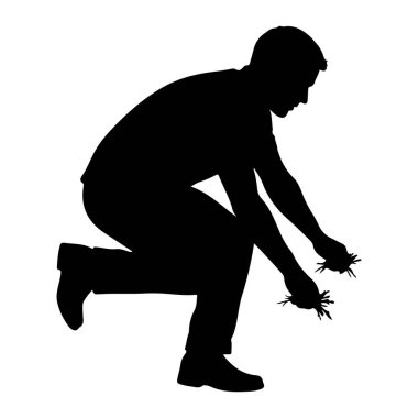 Çömelmiş siyah bir adam silueti tasvir edilir. İki elinde de küçük bitkiler tutuyor, parmakları sapları ve kökleri kavrıyor. Adam pantolon ve ayakkabı giyiyor. Resim beyaz bir arkaplanda izole edilmiştir.