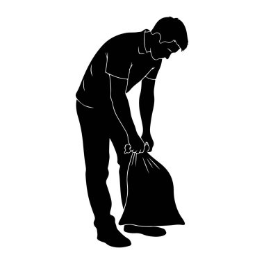 Yandan siyah siluet bir adam tasvir edilir, eğilir ve büyük, dolu bir çöp torbasının üstünde durur. O bir tişört ve pantolon giyiyor, ve elleri çantanın açık etrafında toplanmış, kapalı gibi görünüyor. Arka plan...