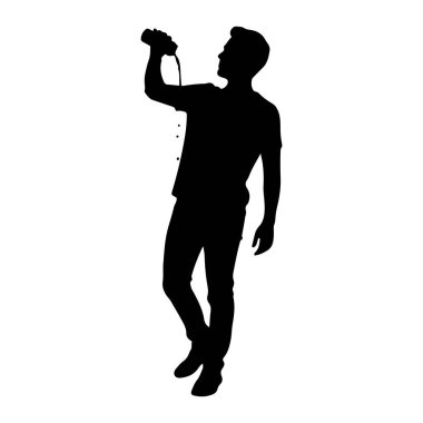 Fotoğraf çekmek için ayakta duran ve elinde kamera tutan siyah bir siluet. O, bir tişört ve kot da dahil olmak üzere günlük kıyafetler giyiyor. Arkaplan düz beyaz.