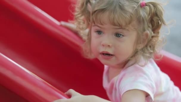 Close Medium Shot Very Cute Little Girl Pigtails Playing Slide — Video Stock