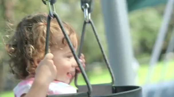 Mother Pushing Little Girl Swing Playground High Quality Footage — Stockvideo