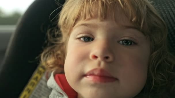 Close Shot Beautiful Toddler Girl Looking Camera While Sitting Her — Stock videók