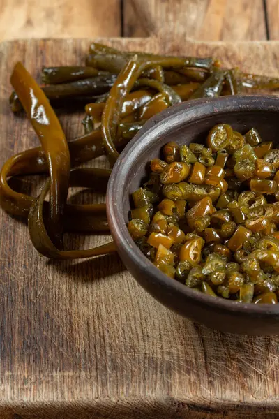 Stock image Chilean Australin peruvian seaweed COCHAYUYO. Choped cooked cochayuyo in bowl.